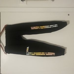 Black joggers with graphic print on both legs